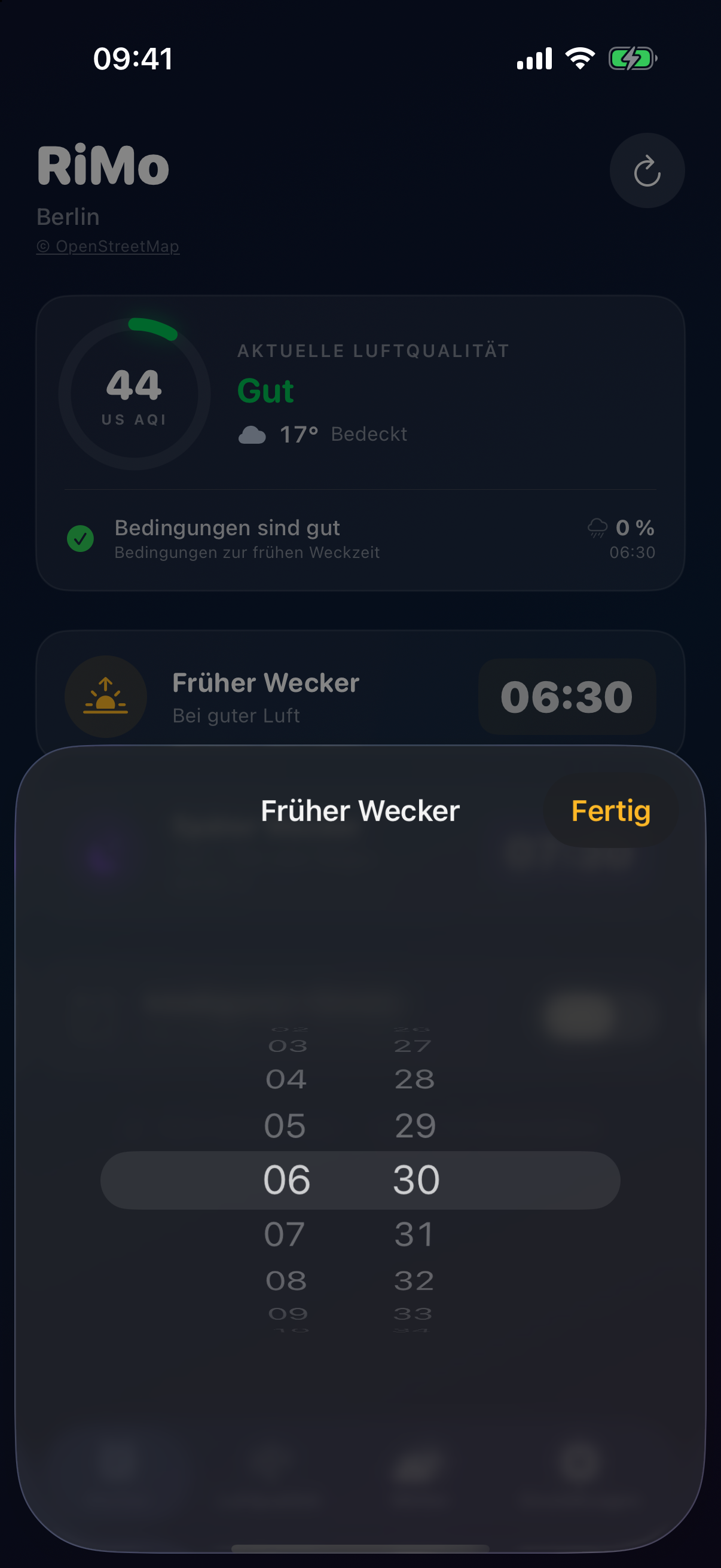 The “Early alarm” time picker open in RiMo. App shown in English.